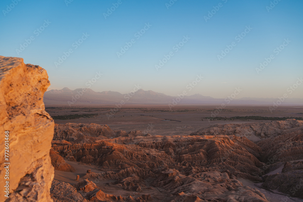 Landscape of rocky hills and mountains in San Pedro de Atacama desert, Chile. Sunset.