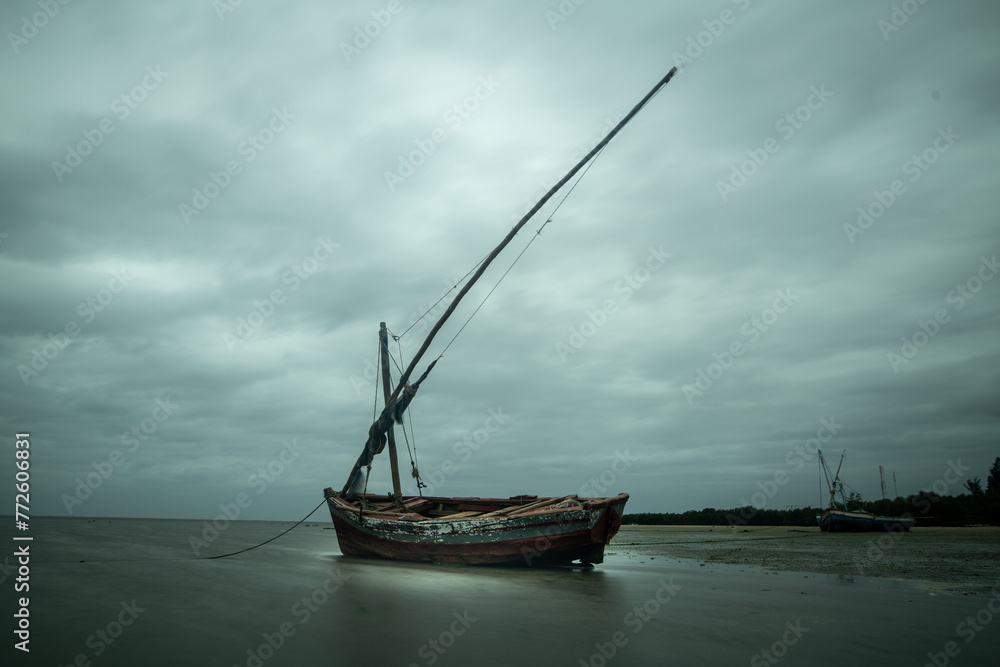 Seascape with a fishing boat in Maputo Mozambique Seascape with a fishing boat in Maputo Mozambique