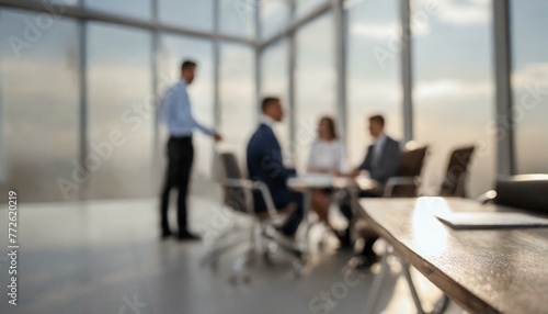 Blurred background with office meeting, working atmosphere