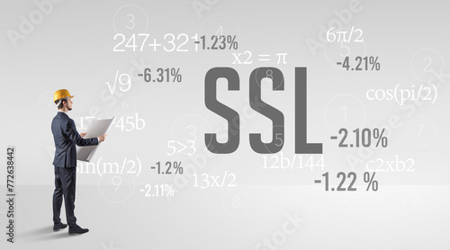 Engineer in hard hat with abbreviation