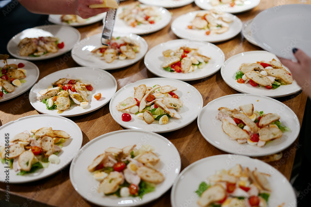 cooking dozens of servings of caesar salad cooking dozens of servings of caesar salad