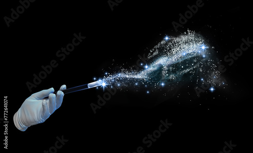 Foto Magician with magic wand performing trick on black background, closeup