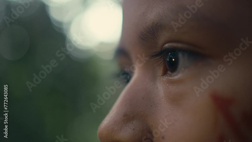 Eyes of Huaoranis young Man photo