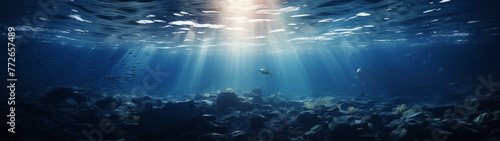 Ocean's Mystique: Sun Rays Filtering Down to the Rocky Seabed