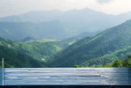 Empty wooden table on mountain background. Surface display for mockup.