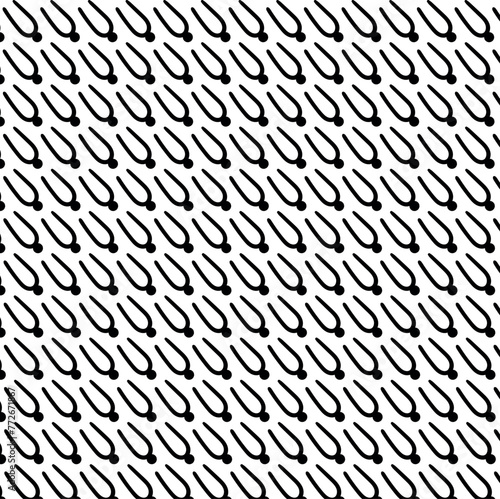 Texture in the form of repeating forks with dots