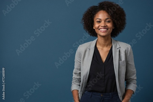 African-american woman with smile on face next to empty space on green dot background for advertising campaigns. Young handsome man indicating place for advertising text in studio. photo