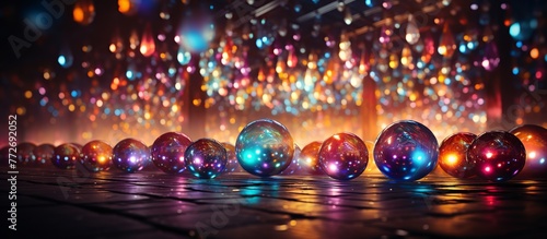 Colorful balls on the background of bokeh lights.