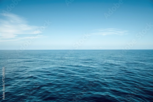 A tranquil background of a distant horizon at sea where the water meets the sky in perfect harmony