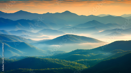 Beautiful sunrise at misty morning mountains © Derby