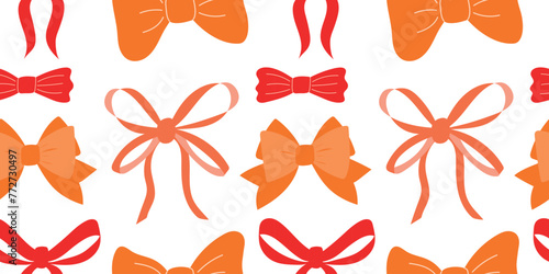 A creative arts product featuring a seamless pattern of orange and red bows, resembling flowers with amber petals on a white background photo