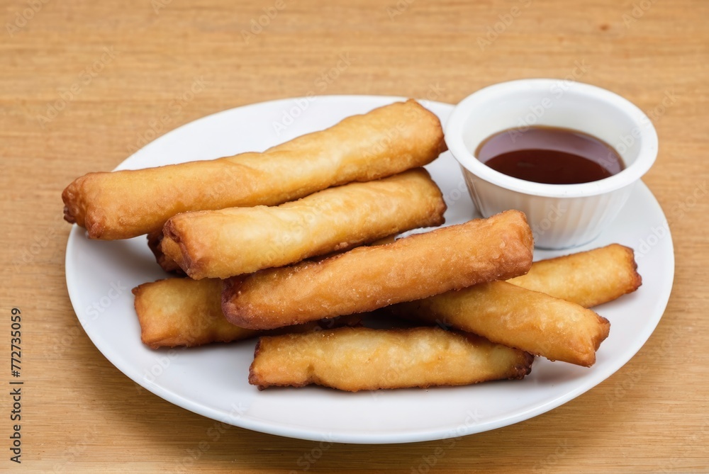 Youtiao These are deep-fried dough sticks often eaten for breakfast or as a snack, sometimes paired with soy milk Youtiao These are deep-fried dough sticks often eaten for breakfast or as a snack, sometimes paired with soy milk