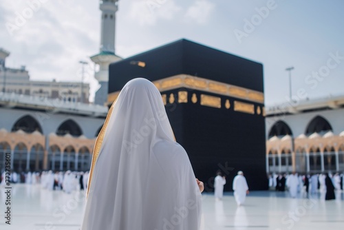 Woman praying in Mecca during Hajj and Umrah