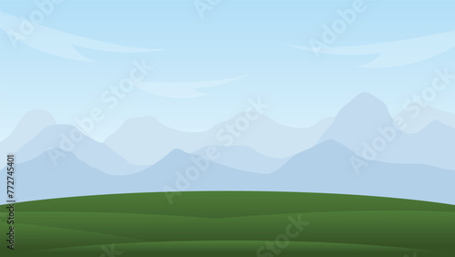 landscape scene. blank green field and mountain background
