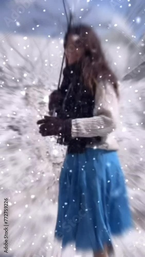 Enjoy with snowfall. Woman in winter clothes. Winter weather. Winter season