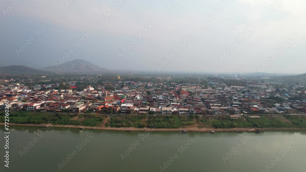 Amazing aerial landscape of the Mekong River and resident houses in the Chiang Khan District in Thailand Amazing aerial landscape of the Mekong River and resident houses in the Chiang Khan District in Thailand
