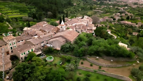 Aerial view of Biniaraix village nestled in lush Mallorcan landscape. photo