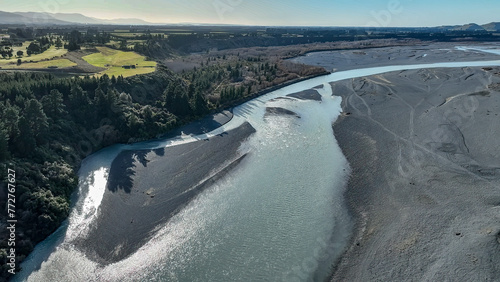 Aerial scenery of the agricultural fields and farm land around the Waimakariri Gorge .