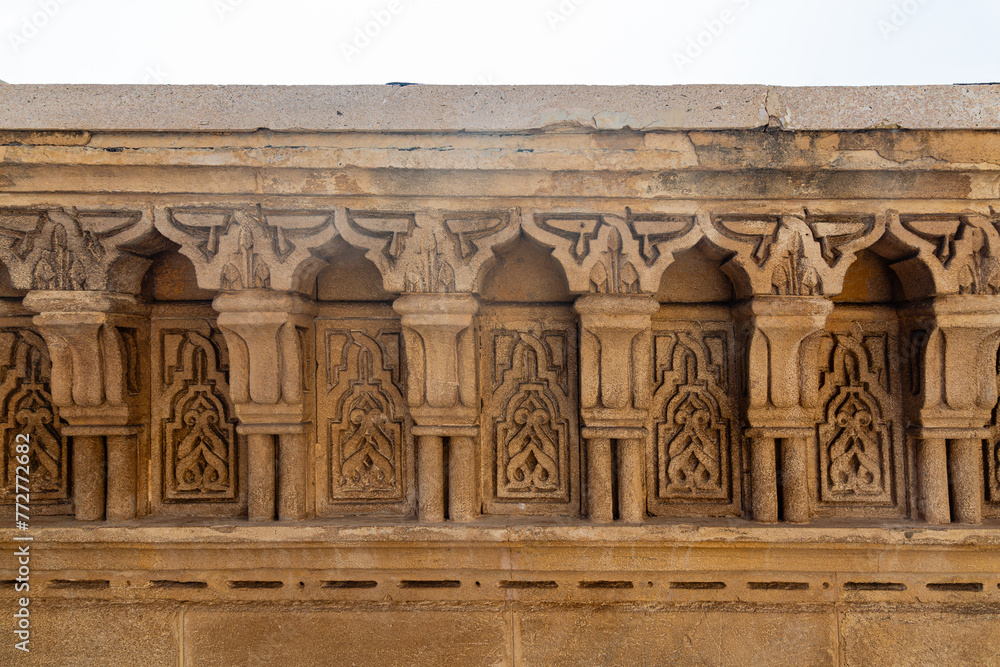 Fototapeta premium Ornaments on stone wall near the mausoleum of Mohammed V in Rabat