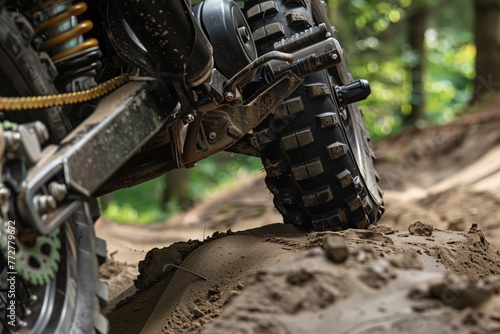 frontwheel suspension system detail while going over an obstacle photo