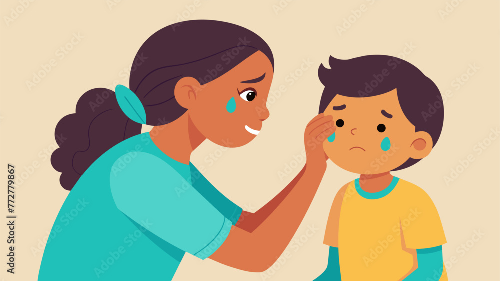 A young child gently wiping away tears from their parents face showcasing the reversal of roles as a source of emotional support and comfort. A young child gently wiping away tears from their parents face showcasing the reversal of roles as a source of emotional support and comfort.