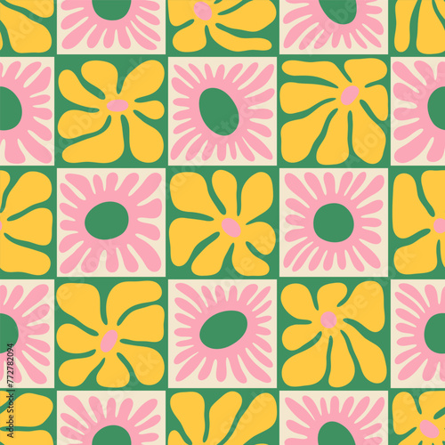 Colorful floral seamless pattern illustration. Vintage style hippie flower background design. Geometric checkered wallpaper print, spring season nature backdrop texture with daisy flowers. © Dedraw Studio