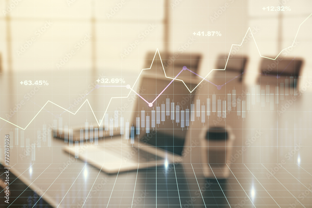 Multi exposure of abstract financial graph on laptop background, financial and trading concept Multi exposure of abstract financial graph on laptop background, financial and trading concept