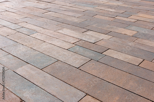 Paving slabs of rectangular elongated shape of different sizes and colors. Angled view.
