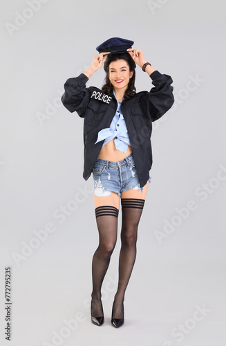 Beautiful pin-up police off...