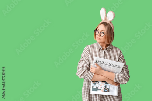 Adult female manager in bun...