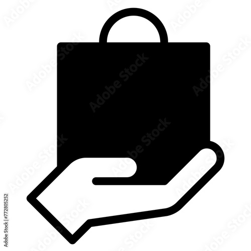 Hand holds shopping bag icon