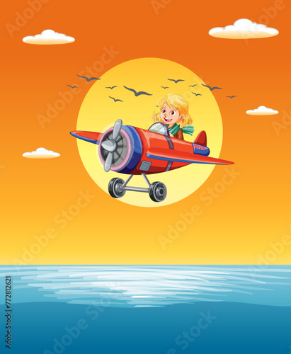 Young pilot enjoys a scenic flight over the ocean.