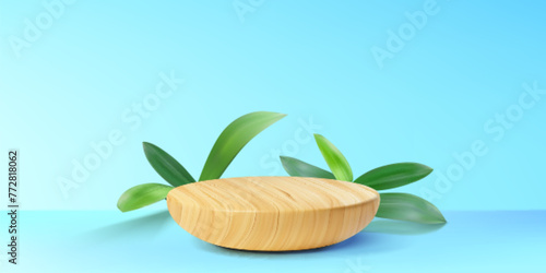 Wooden product podium with green leaf decoration in studio room interior with pastel turquoise wall and floor. Realistic vector mockup of round light brown platform with wood texture.