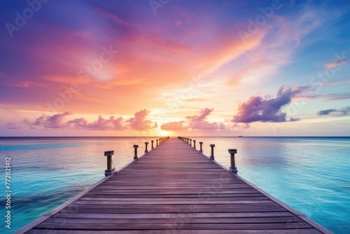 Wooden jetty at sunset in tropical  island with water bungalows An amazing sunset landscape Picturesque summer sunset   Ai generated
