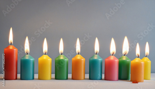 a row of colorful candles colorful background