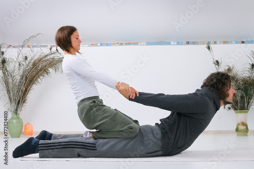 Man getting Shiatsu massage from Shiatsu masseuse