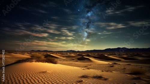 A desert landscape with a large starry sky and a large cloud of milk photo