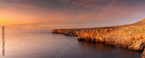 cliffs and rugged shorelina at Pont d'en Gil in northeastern Menorca near Ciutadella just after sunset