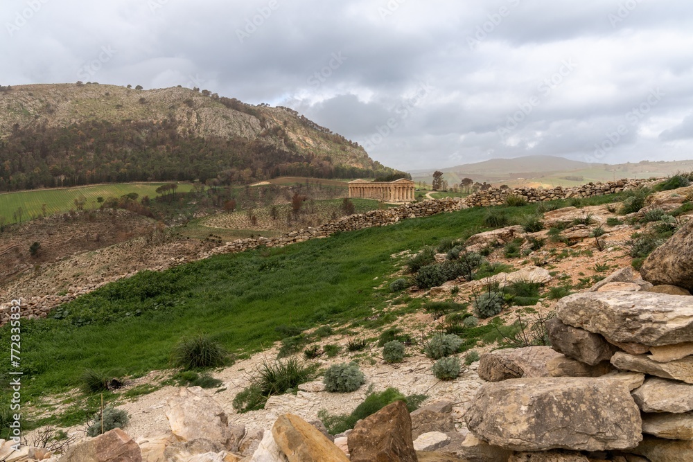 landscape of Segesta with the ancient Greek temple under an overcast sky