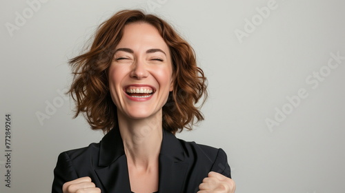 Woman clenching her fists, closing her eyes, smiling brightly and cheering. The joy of victory, success, and passing. Business woman, job seeker, applicant. Isolated on white background. Generating AI