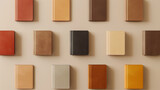 A collection of various colored notebooks neatly organized side by side on a soft beige background