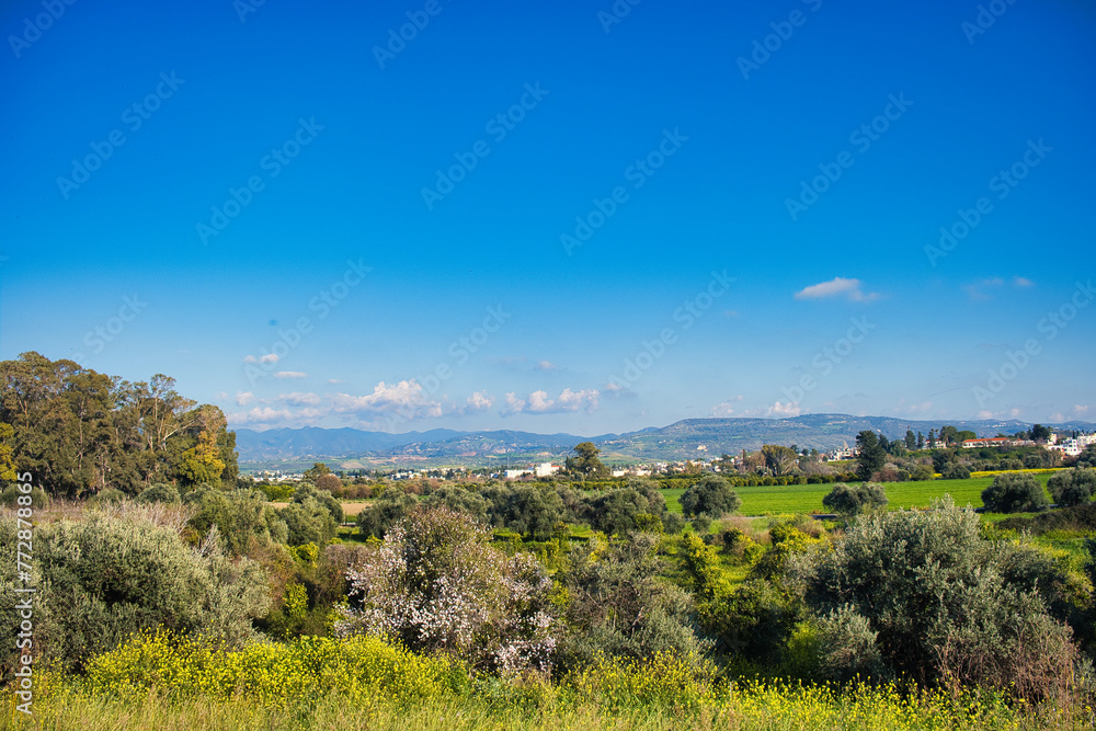 Landscape with trees, meadows and mountains at the northwest coast of Cyprus. In the distance the town of Polis
Landscape with trees, meadows and mountains at the northwest coast of Cyprus. In the distance the town of Polis