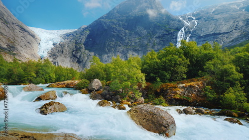 The incredible nature of Norway is a turbulent river from the melted waters of the Briksdal Glacier