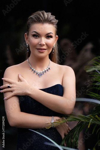  Adorable romantic girl Beautiful young elegant woman in blue dress posing