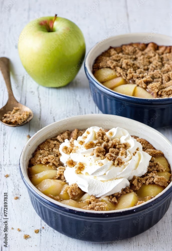 A traditional Danish apple dessert made with stewed apples, rye bread crumbs, sugar, and whipped cream A traditional Danish apple dessert made with stewed apples, rye bread crumbs, sugar, and whipped cream