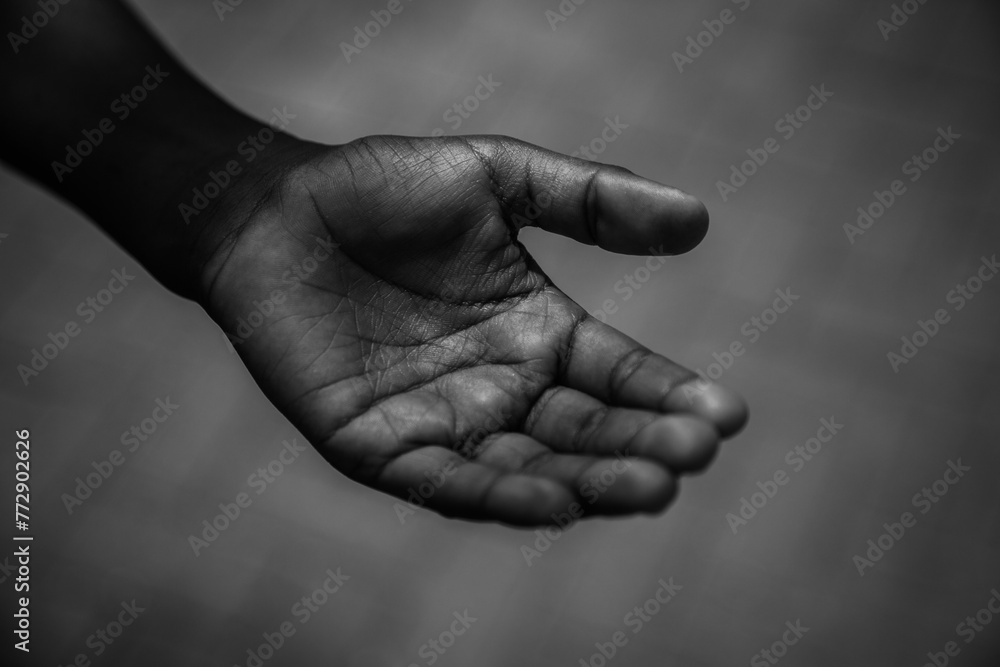 Grayscale closeup shot of a person's palm.