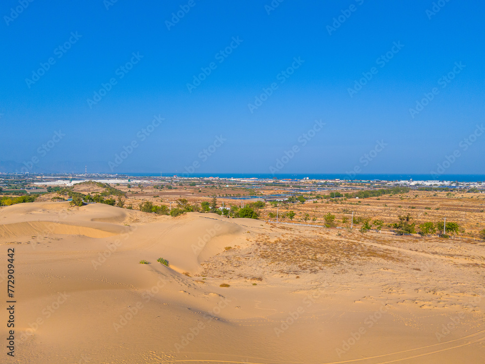 Aerial view of Nam Cuong sand dunes, Ninh Thuan province, Vietnam. It is one of the most beautiful places in Vietnam Aerial view of Nam Cuong sand dunes, Ninh Thuan province, Vietnam. It is one of the most beautiful places in Vietnam