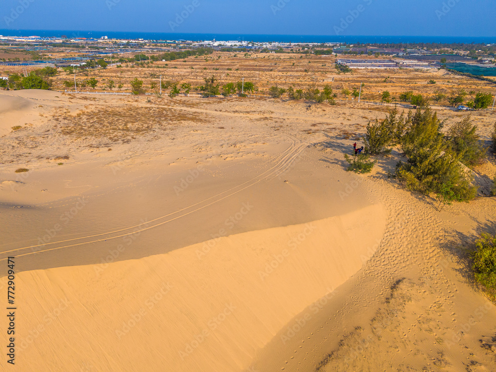 Aerial view of Nam Cuong sand dunes, Ninh Thuan province, Vietnam. It is one of the most beautiful places in Vietnam Aerial view of Nam Cuong sand dunes, Ninh Thuan province, Vietnam. It is one of the most beautiful places in Vietnam
