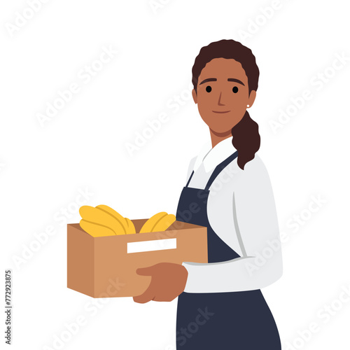 Greengrocer selling fruits. Young black woman holding box of banana. Flat vector illustration isolated on white background