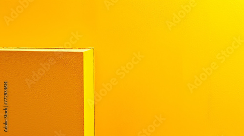 a yellow wall with a rectangular object